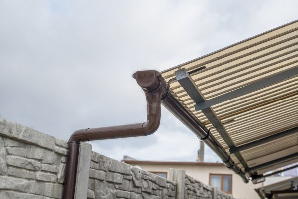 Plastic Downspout Installation in Seminole